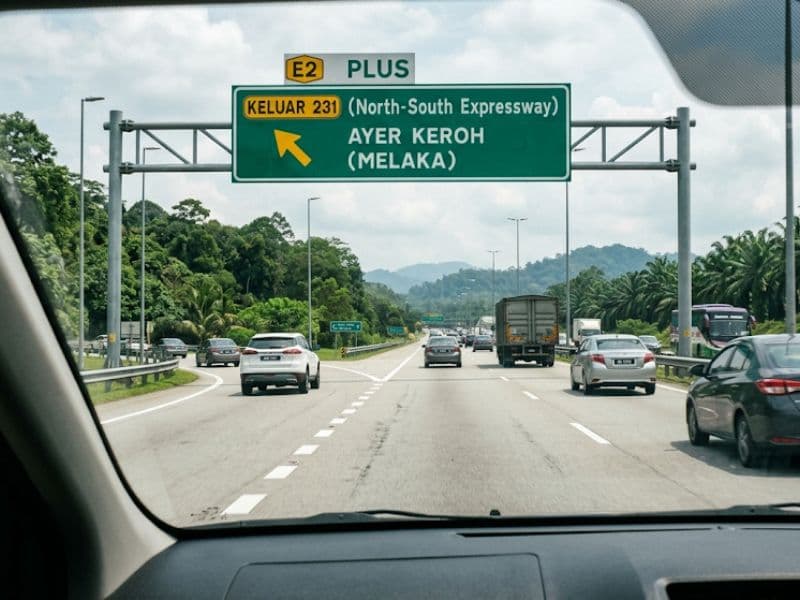 Highway directional sign pointing to Melaka on the PLUS expressway south from Kuala Lumpur.